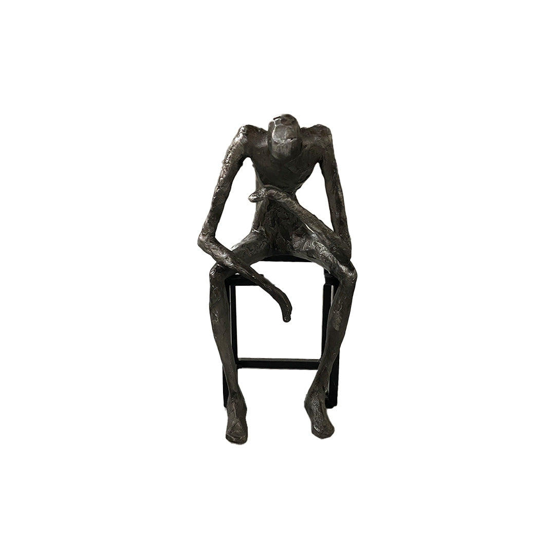 Escultura Hombre Sentado